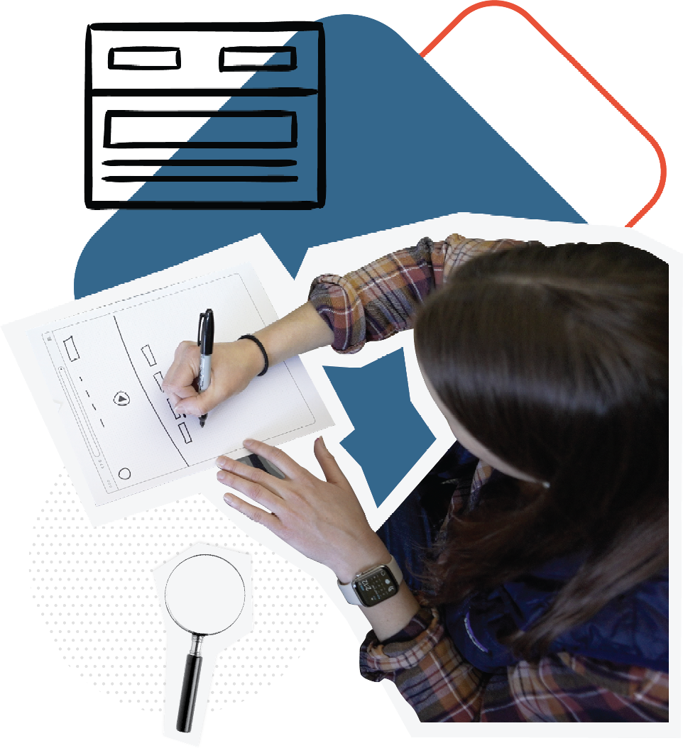 female designer mocking up an application on a piece of paper